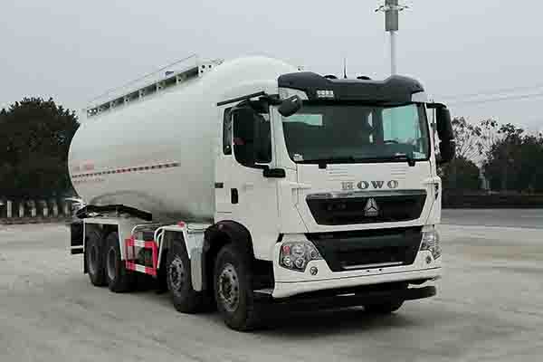 Powder material transport vehicle